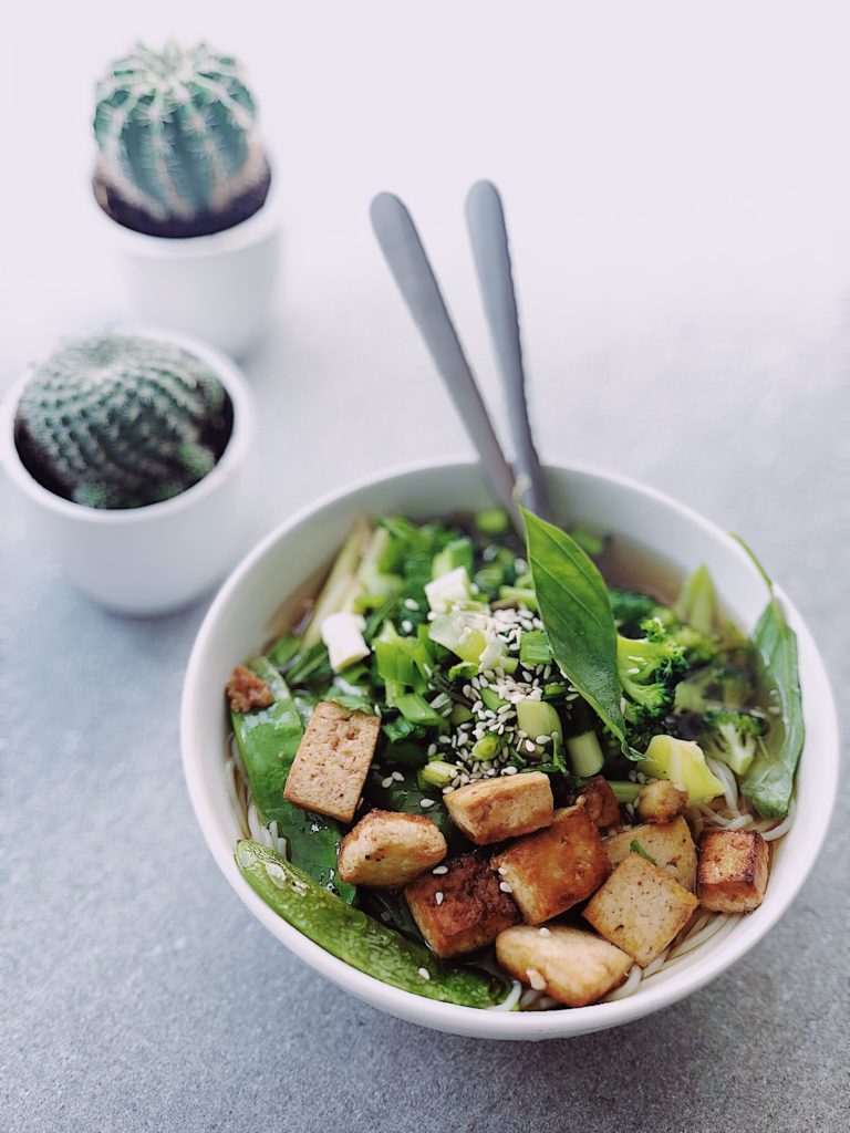 some kind of pho bowl with noodles and crunchy bread cubes